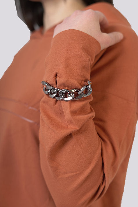 Sweat tunic - detail of bracelet - hooded